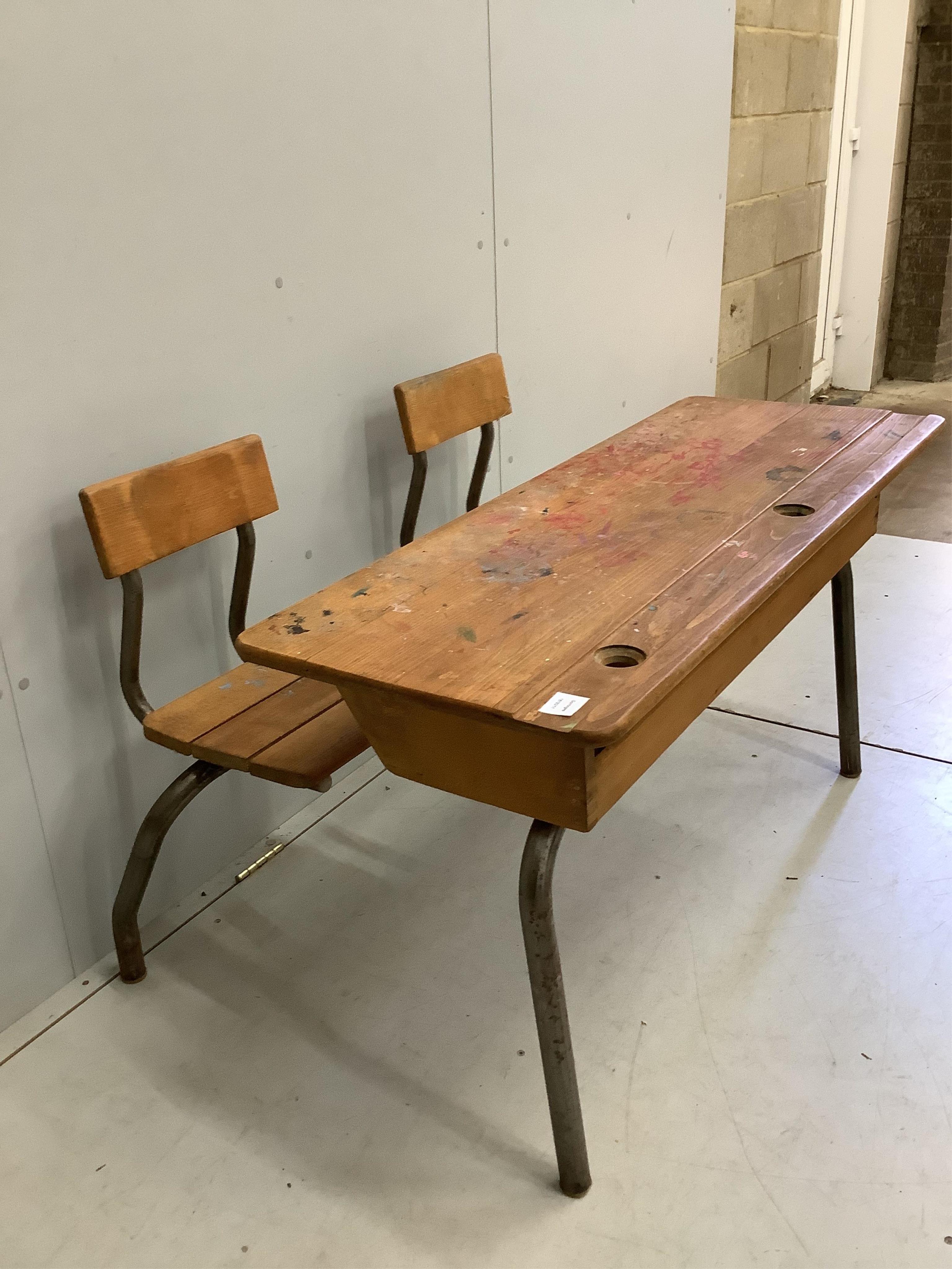A vintage beech and tubular steel child's double desk, width 119cm, depth 79cm, height 72cm